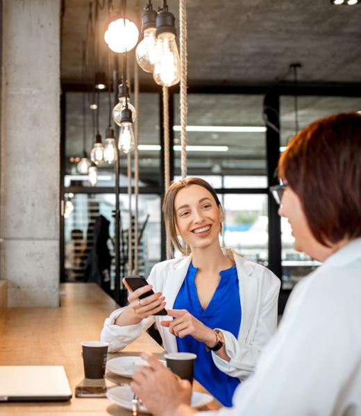 business-women-sitting-in-the-cafe-5TLD5K3-768x768